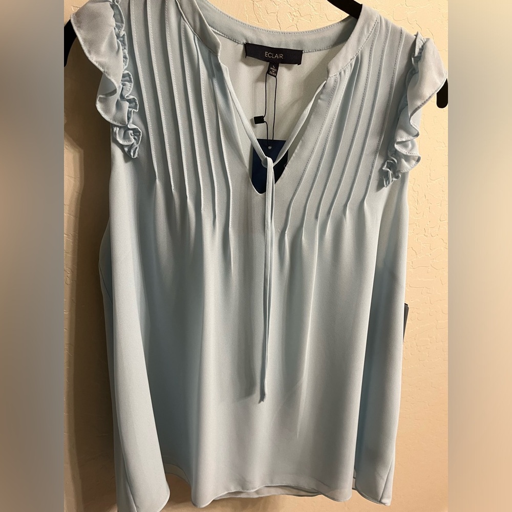 New Women’s sleeveless blouse.